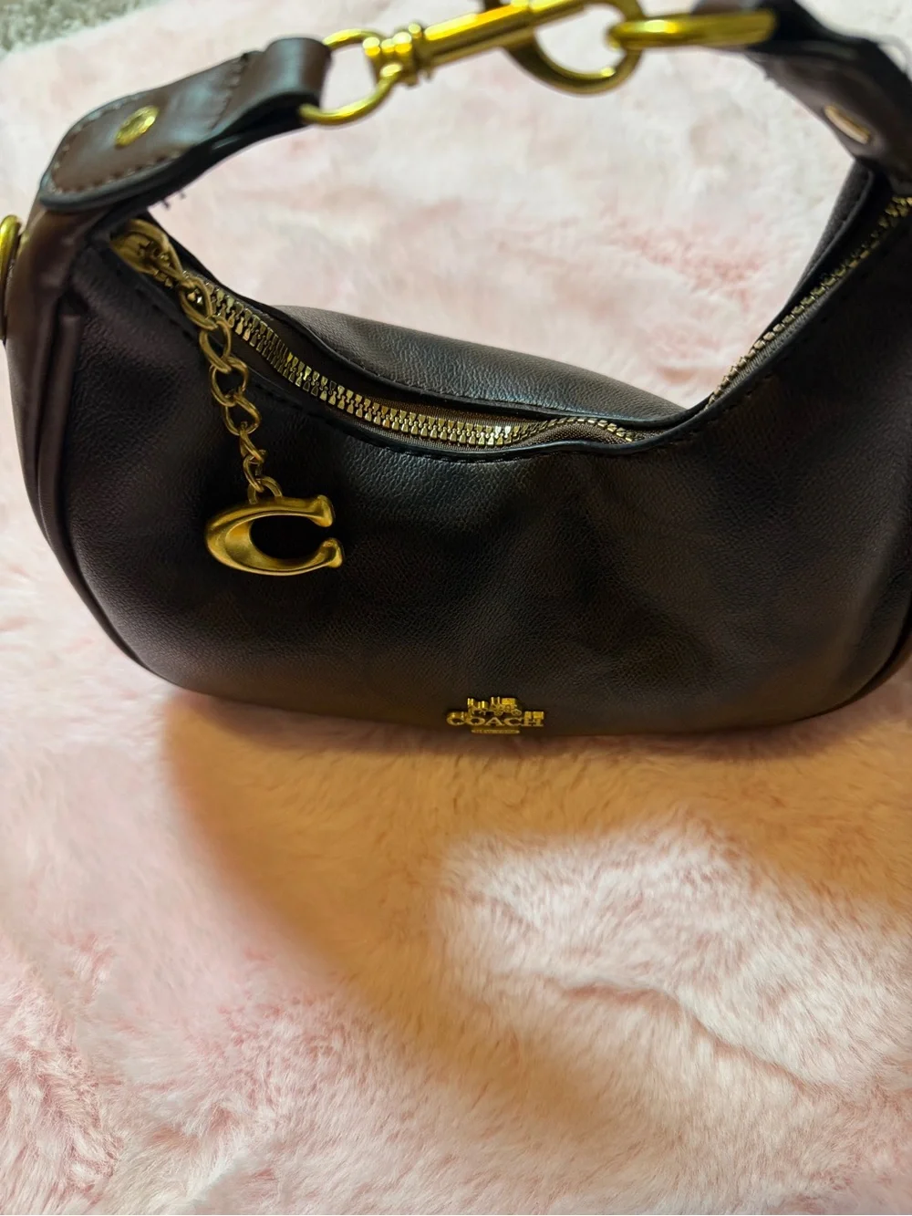 Coach sleek black